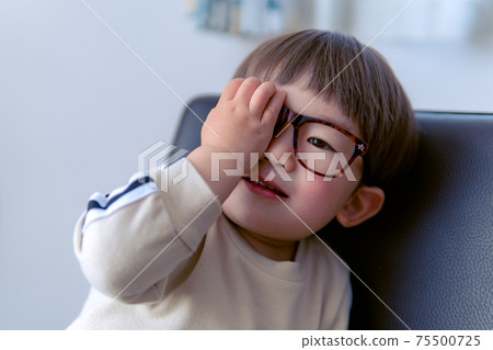 Boy with glasses negative image Boy with glasses negative image 75500725
