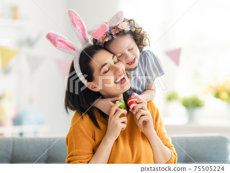 Family celebrating Easter Family celebrating Easter 75505224
