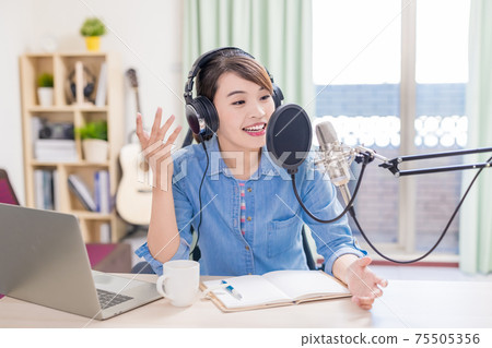 woman make podcast in studio 75505356