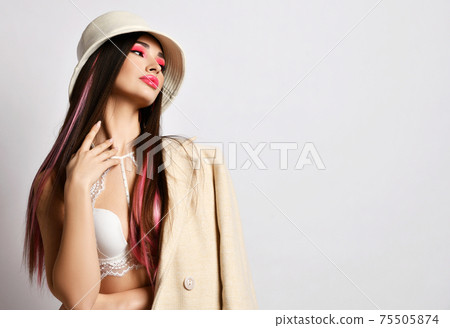 Glamorous sensual languid woman with pouty lips 75505874