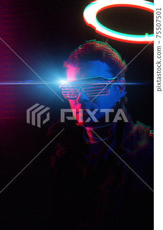 Cyberpunk style portrait of man in futuristic costume. Image with glitch effect. Cyberpunk style portrait of man in futuristic costume. Image with glitch effect. 75507501