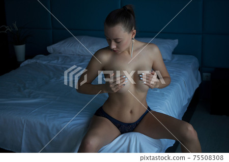 Topless voluptuous woman in bedroom Topless voluptuous woman in bedroom 75508308