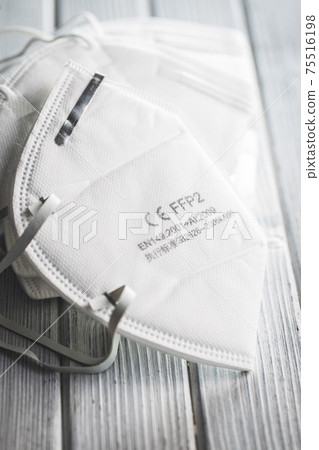 KN95 face mask. FFP2 mask as covid-19 protection. Coronavirus  protection mask 75516198