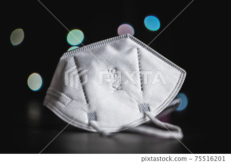 KN95 face mask. FFP2 mask as covid-19 protection. Coronavirus protection mask KN95 face mask. FFP2 mask as covid-19 protection. Coronavirus protection mask 75516201