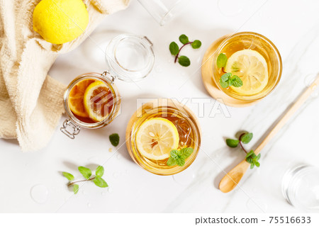 Homemade Iced Tea and Lemonade with Mint Homemade Iced Tea and Lemonade with Mint 75516633