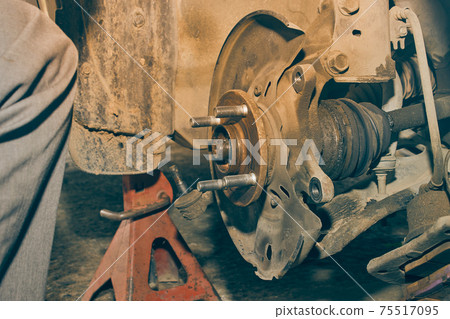 Car Wheel Hub and Drive Axle and Shock Absorber and Jack Stand in Vintage Tone 75517095