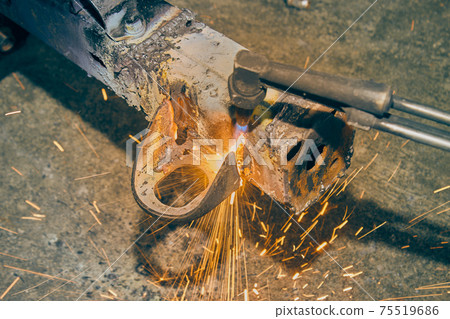 Top View Car Part Removal by Oxygen Acetylene Cutting Technique in Vintage Tone Top View Car Part Removal by Oxygen Acetylene Cutting Technique in Vintage Tone 75519686