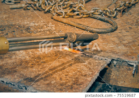 Right View Checker Plate Cutting by Oxygen Acetylene Cutting Torch Technique in Vintage Tone 75519687