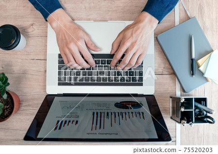 top view. business man analyzing financial data. 75520203