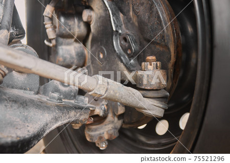 Back View Outer Tie Rod End and Wheel Hub and Brake Caliper Back View Outer Tie Rod End and Wheel Hub and Brake Caliper 75521296