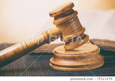 Judge's gavel and old book Judge's gavel and old book 75521479