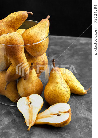 Organic Pears on Rustic Dark Background with Copy Space Organic Pears on Rustic Dark Background with Copy Space 75524294