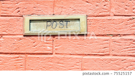 Old letterbox in the door, traditional way of delivering letters to the house, old mailbox Old letterbox in the door, traditional way of delivering letters to the house, old mailbox 75525157