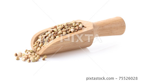 Buckwheat in wood scoop isolated on the white background 75526028