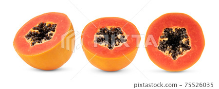 half  ripe papaya fruit with seeds  on white background 75526035