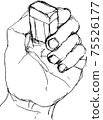 Hand holding an eraser 75526177