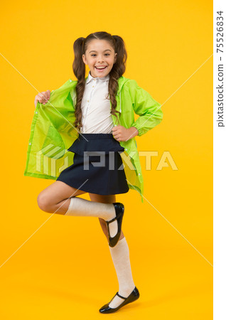 Ready to walk in any weather. Energetic schoolchild Ready to walk in any weather. Energetic schoolchild 75526834