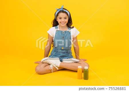 Healthy food is great for her health. Little child enjoy Healthy food is great for her health. Little child enjoy 75526881