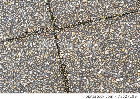 Pebble stone in outdoor tiles with geometric diagonal shapes. Close up. Copy space Pebble stone in outdoor tiles with geometric diagonal shapes. Close up. Copy space 75527199
