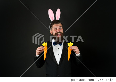 Happy to be healthy. Easter bunny bringing carrots. Happy to be healthy. Easter bunny bringing carrots. 75527218