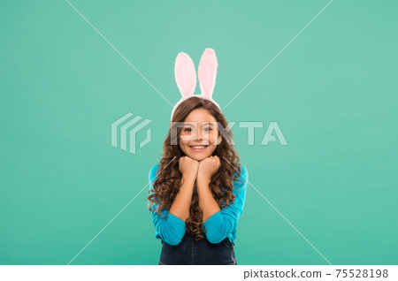 Celebrate in style. Happy girl celebrate Easter. Little girl Celebrate in style. Happy girl celebrate Easter. Little girl 75528198