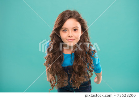 Hairdresser is a girls best friend. Adorable little child  75528200