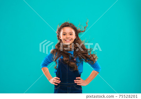 Little girl with long hair. Kid happy cute face with adorable 75528201