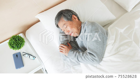 asian senior man sleep well 75528628