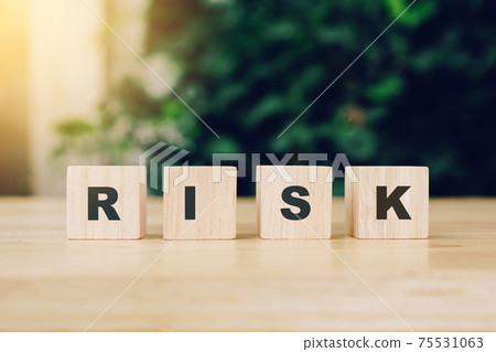 Word RISE block wood on wooden table background. RISE Business concept. 75531063
