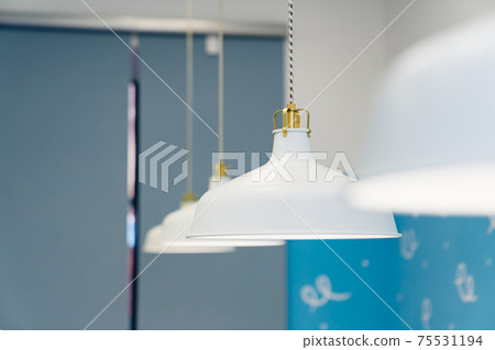 simple white hanging chandeliers in the room. simple white hanging chandeliers in the room. 75531194