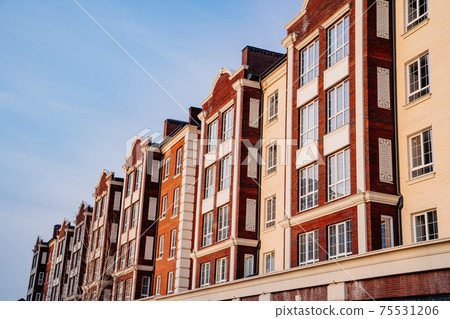 typical low-rise apartment building. construction of affordable housing.  75531206