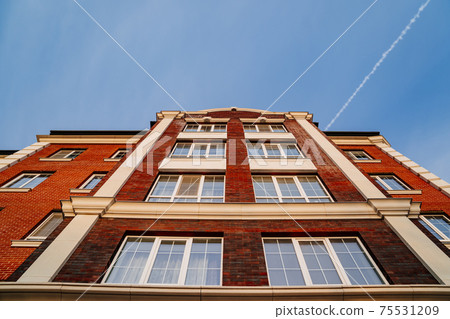 typical low-rise apartment building. construction of affordable housing. typical low-rise apartment building. construction of affordable housing. 75531209