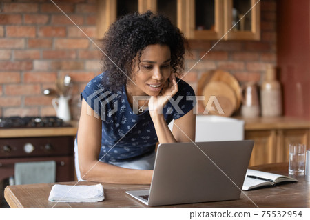 Curious black lady look at pc solve problem in mind Curious black lady look at pc solve problem in mind 75532954