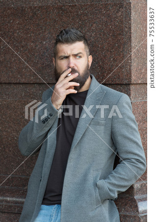 brutal mature bearded man with moustache smoking cigarette brutal mature bearded man with moustache smoking cigarette 75533637