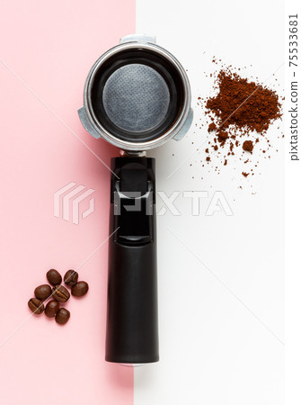 Espresso machine filter, ground coffee and coffee beans. Espresso machine filter, ground coffee and coffee beans. 75533681
