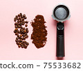 Espresso machine filter, ground coffee and coffee beans. 75533682