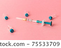Syringe with several medical vials for injection. 75533709