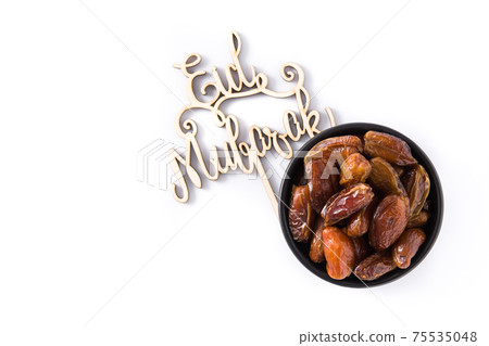 Dates isolated on white background Dates isolated on white background 75535048