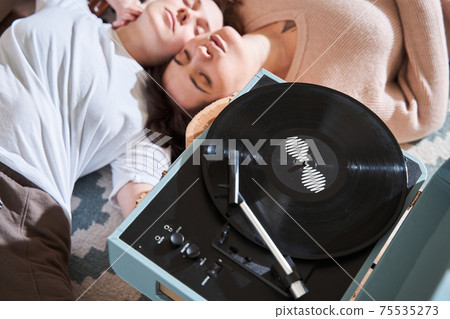 Woman and her girlfriend are hugging and enjoying spending time together 75535273