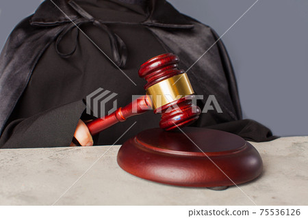 Portrait of serious smart child in graduation cap Portrait of serious smart child in graduation cap 75536126
