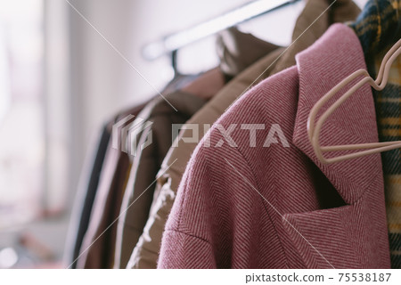 Closeup of various clothes on hanger, Closeup of various clothes on hanger, 75538187