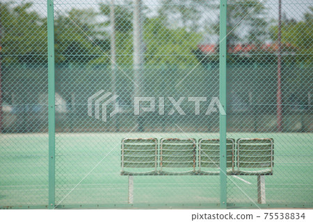 Tennis court and bench 75538834