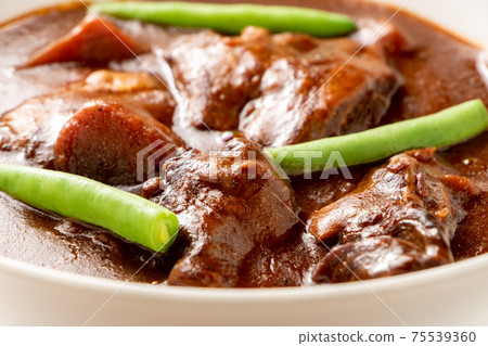 Up of beef tongue stew. Up of beef tongue stew. 75539360
