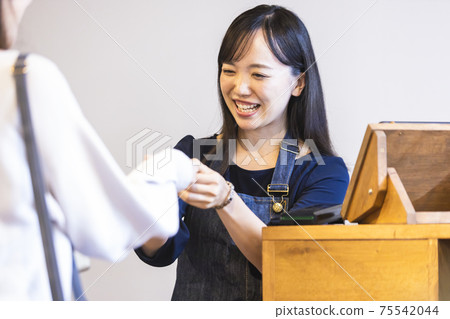 Cafe female staff 75542044