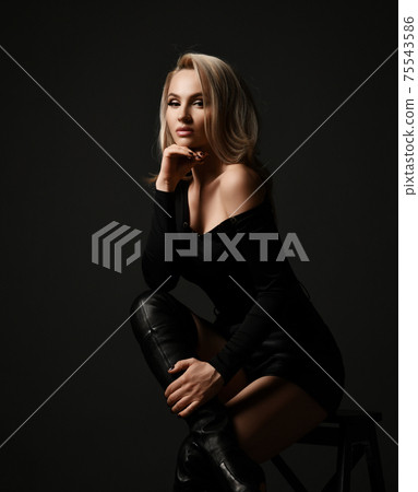 Sexy blonde woman in black clothes with naked 75543586