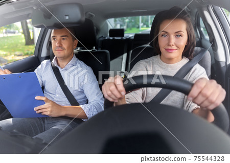 car driving school instructor and young driver 75544328