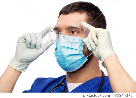 male doctor in goggles, mask and gloves male doctor in goggles, mask and gloves 75544375