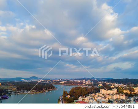 Aerial view of Dalat city. The city is located on the Langbian Plateau in the southern parts of the Central Highlands region of Vietnam Aerial view of Dalat city. The city is located on the Langbian Plateau in the southern parts of the Central Highlands region of Vietnam 75544891