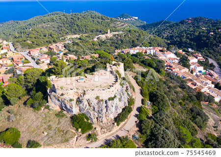 View from drone of remains of medieval castle of Begur, Catalonia, Spain 75545469
