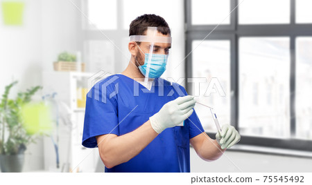 male doctor in mask with cotton swab and test tube 75545492